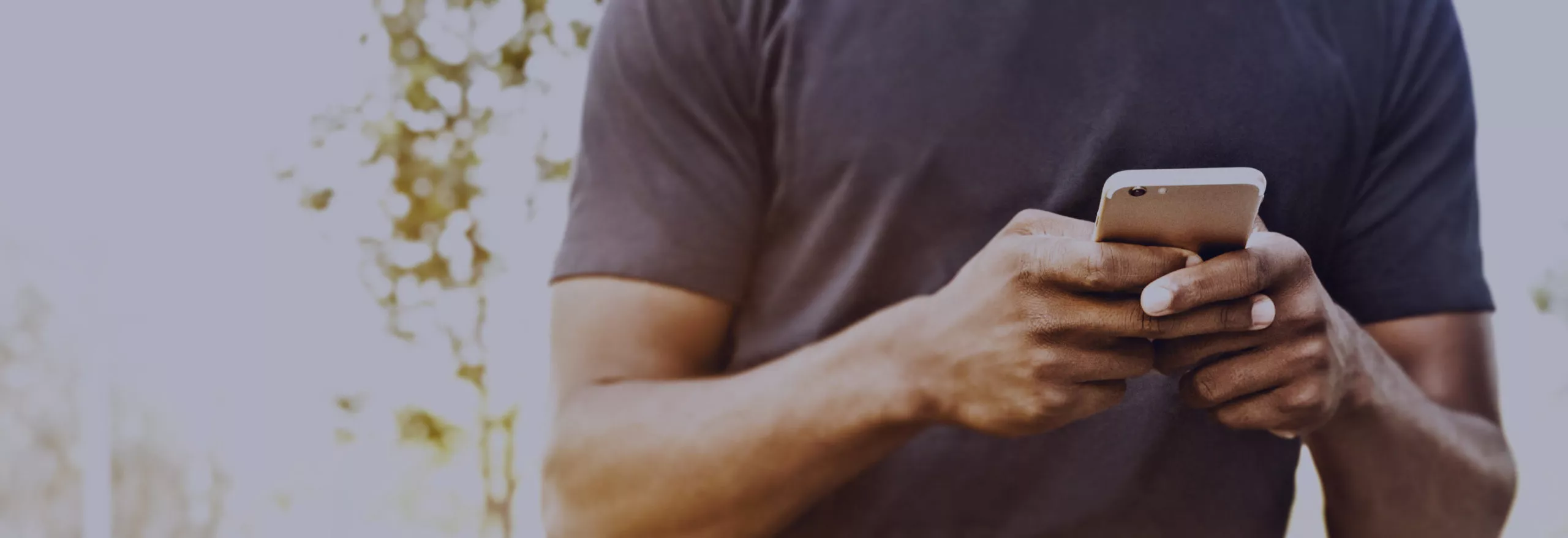 Individual checking phone.