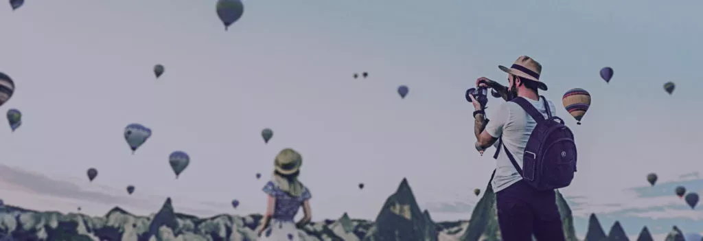 Couple traveling taking pictures.