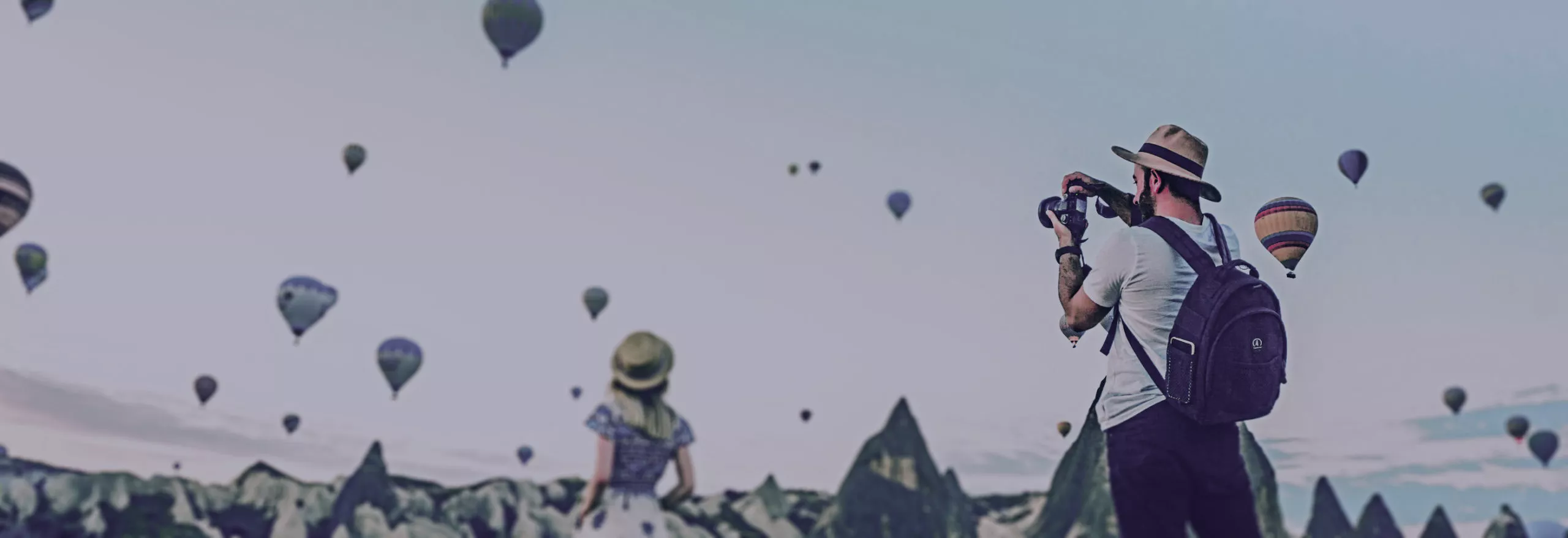 Couple traveling taking pictures.