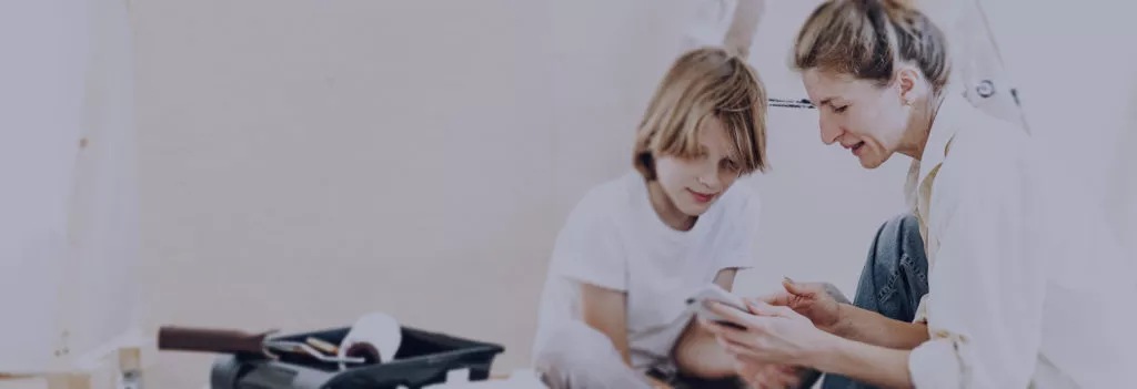 Mother and son painting room.