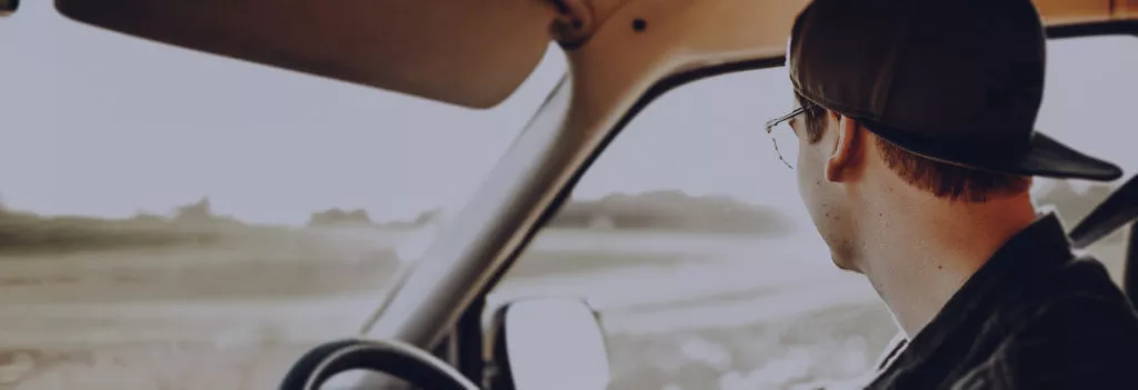 Man travelling in car.