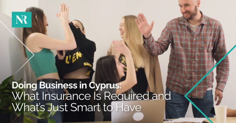 Image of a group of young professionals, huddled around a laptop and celebrating with high-fives, with the words, Doing Business in Cyprus, What Insurance Is Required and What is Just Smart to Have